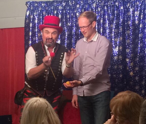 Picture of Kevin Burke performing magic.